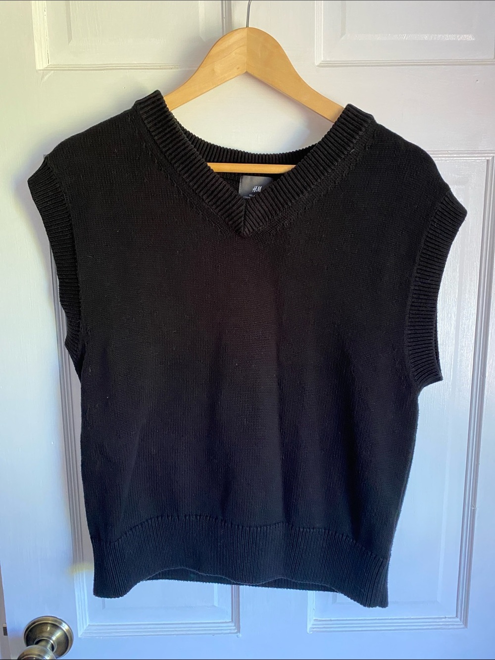 Black sweater vest